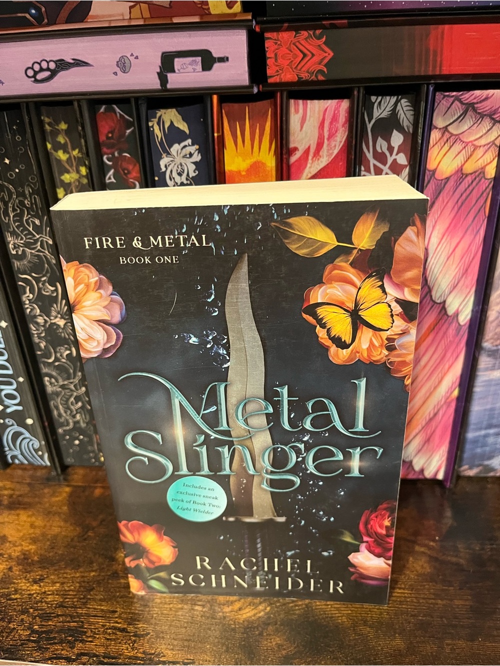 Metal Singer by Rachel Schneider - Dark Cover with Floral & Butterfly Art